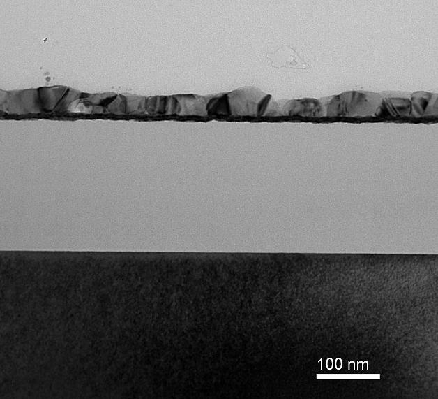 Fig. 5. A TEM cross section of ~ 300 Å of copper grown onto Ru at 125 C using KI5/formic acid in the hot wall reactor. Table 1.