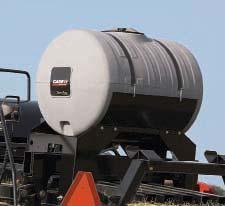 This system uses a large rotor to feed crop from the pickup through a row of spring-protected knives before entering the