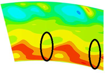 These are the cold streaks of the coolant that travel downstream along with the wakes. In steady simulations, the mixing plane mixes out the wakes.