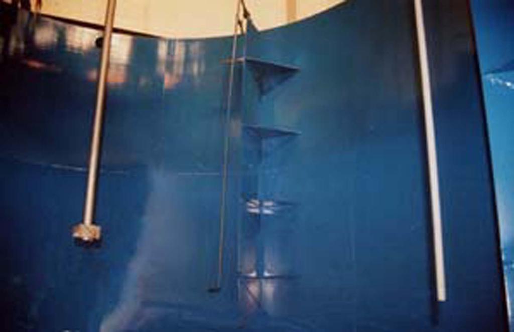 A water treatment tank sprayed with blue OR70SS for Midwest Generation