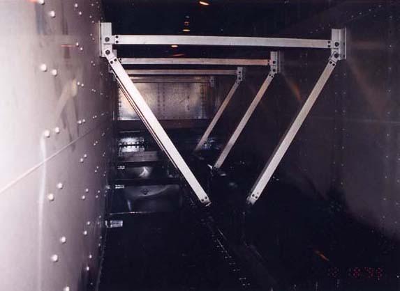 Interior of a rotary dump rail car Sprayed with Black OR70SS 100% solids Sprayable