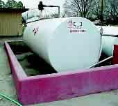Above-ground tanks containing 660 gallons or more require secondary containment. The State Fire Marshal recommends that some sort of secondary containment be used with all fuel storage tanks.