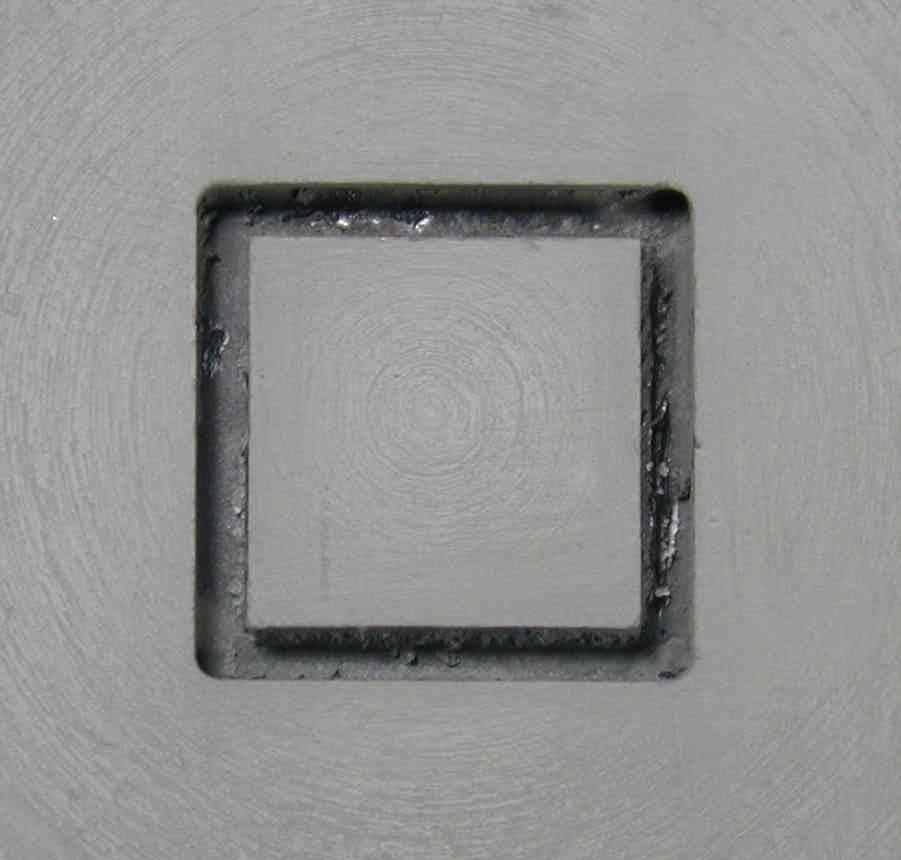 dimensional profile of the cube (top row) and the grooves filled with paraffin wax (bottom row).