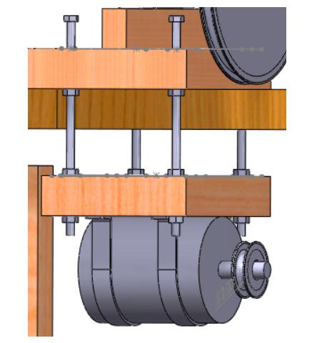was implemented in the design. A 2-inch diameter pulley is mounted on the generator shaft, and an 8-inch diameter pulley is mounted on the main rotating shaft.
