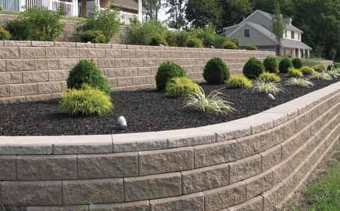 Functionality Design walls that work with your landscape and add value.