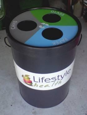 This rotomoulded recycling bin also has a removable lid with 3 round throw-in holes and black rope handles for easy lifting.