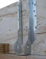 Joist hanger required if: Joist located over opening, or Joist bearing a top plate is less than 1-3/4 in.