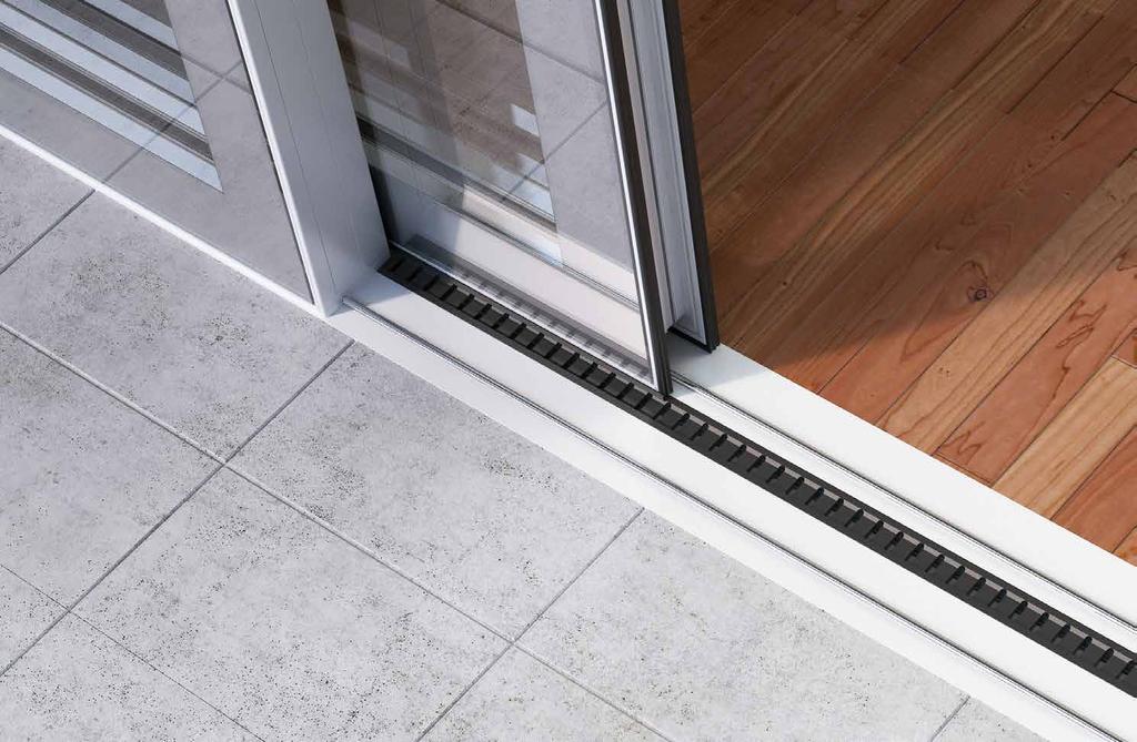 In practice, the sliding system guide rail can be fully recessed in the floor leaving only the inox roller guide protruding (5mm).
