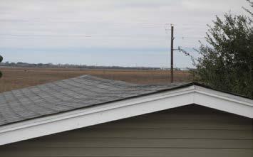 leaks, holes, charred, or deteriorated roofing materials, rotted wood,