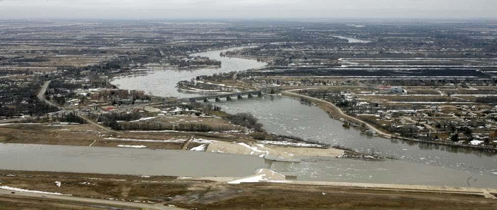 Flood Control - Floodway (Diversion Channel) transports floodwaters away from populated areas Eample = Winnipeg, Canada, built ~30 mile floodway around city in