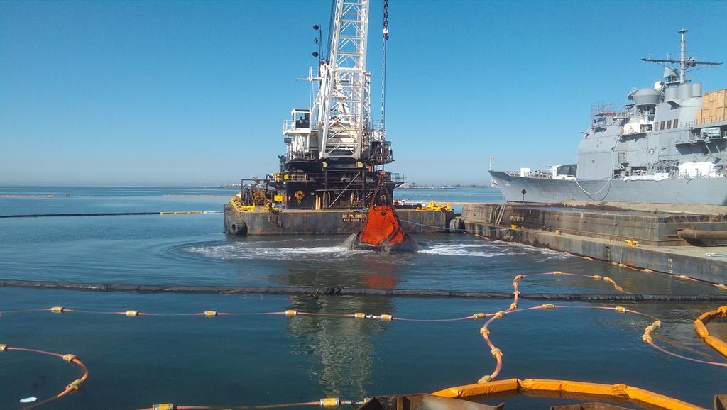 Environmental benefits: This project removed approximately 27,000 cubic yards of sediments from the San Diego bay improving bay water quality. Environmental bucket during dredging operations.