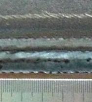 profile with 40 groove; (c) Hybrid welding weld front profile with 30 groove; (d) Hybrid