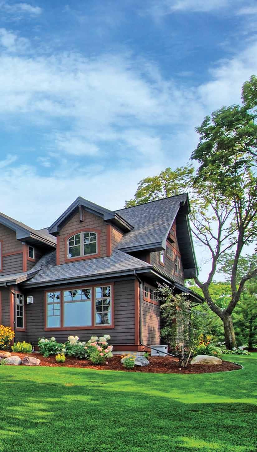 The Morinvilles achieved the home s vintage exterior look via earth tone color palette and a craftsman style combination of siding materials including horizontal lap,