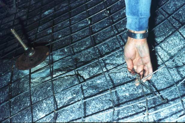 This allows air cavities to form behind the mesh and these may allow water to enter and cause corrosion of the mesh.