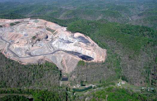 Mountain Top Removal Explosives, earth movers, & large power shovels are used
