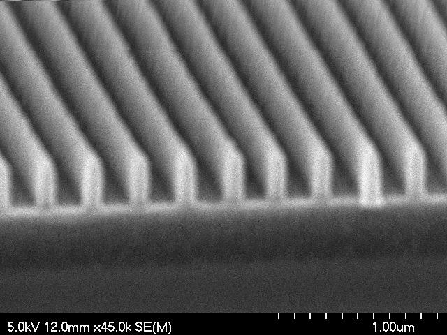 PR 350nm 100nm 200nm Si-hardmask Figure 3. E-beam lithography result For the Si hardmask layer we compared the processing results of SiON etch and etch. SiON was CVD ed and was spun onto the layer.