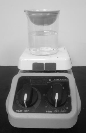 evaporating dish with product heat/stir plate 250-mL beaker with 150 ml water and stir bar Figure 1. Set-up for drying the product 18.