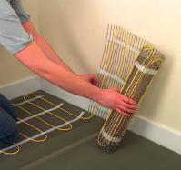 In some situations a small channel may have to be made in the floor to accommodate the tubing. If so, cut a channel from the thermostat position approximately 20-30cm across the floor.