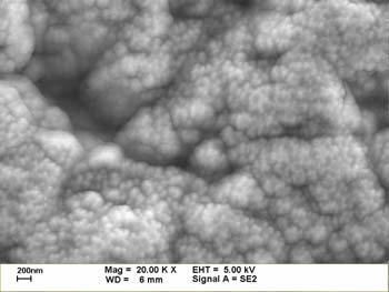 (c) (d) Fig.4 The surface and components of the as-deposited DLC and Cr-DLC films were observed by SEM and EDS. Fig. (a) shows the amorphous DLC film on PCBN cutter surface, and Fig.