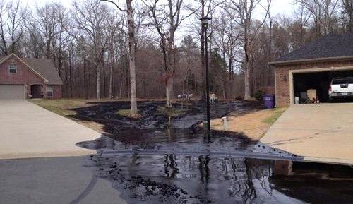 Oil Spill from Field into Residential Area Problems can exist from co-location of oil fields and surrounding neighborhoods.