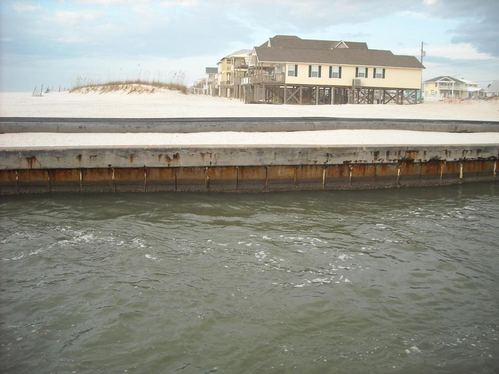 Figure VI-4. Example of Concrete Sheet Piles Steel groins may be as simple as a line of sheet piling, or a combination of H-piling, waling, and sheeting.