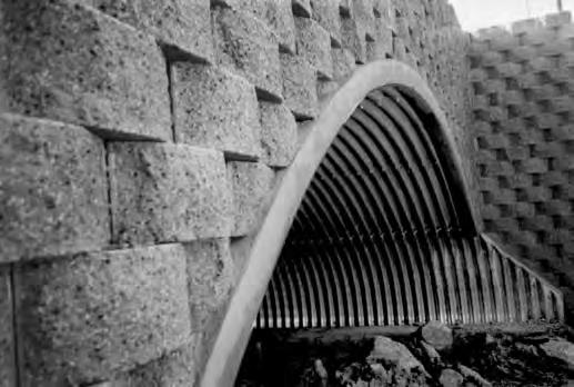 CONSTRUCTION H-5 W A T E R A N D D R A I N A G E Keystone Retaining Walls are an ideal system for economical and effective use with steel multi-plate arch design: INSTALLATION: Cut Keystone units to