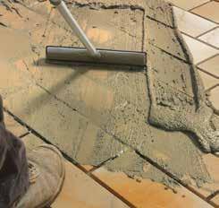 6. Prepare a damp mortar mix of part cement