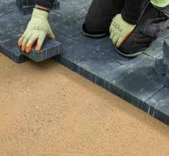 Install your choice of edge restraint on a concrete footing