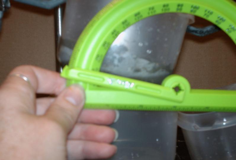 rate. Using a protractor to