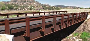We also make a utility truss bridge to carry conveyors or large pipes across rivers or roads.
