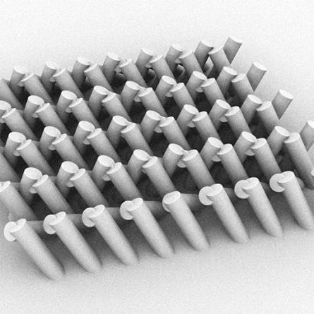 The right image is of a coiled spring. This would be a very difficult component to fabricate using surface or bulk micromachining.