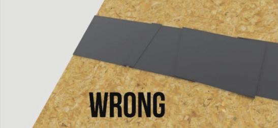 Lap underlayment with minimum 6-in. leg turned up at wall intersections; lap wall weather barrier over turned-up roof underlayment.