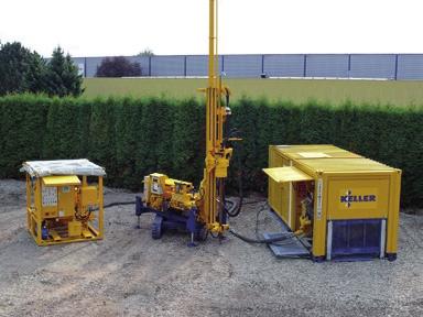 Several high pressure hose connections and control cable lines connect the pumping unit with the Soilcrete drilling rig at the installation point.