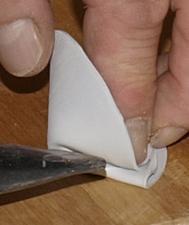 15. Heat the first crease and press it