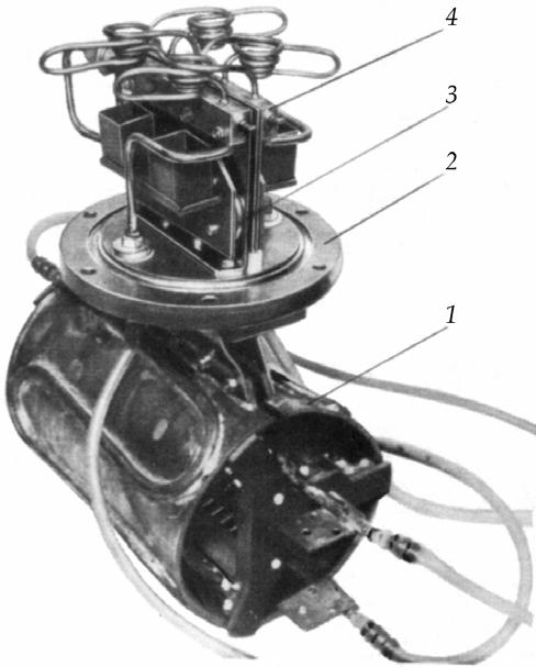 300 Advances in Induction and Microwave Heating of Mineral and Organic Materials Fig. 21. Photograph of levitation evaporation system with 4-fold inductor unit.