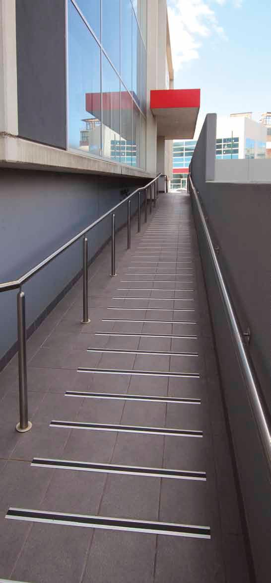 2.7 2.7 Traction Bars & Non-Slip Tapes Traxion Series Whether used on stairs or on ramps, the Traxion series offers high levels of slip-resistance wherever installed.