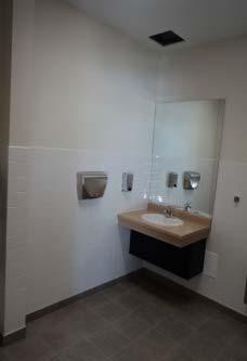 room requirements, showers/bathtubs, shelves, counters for public telephones, and drinking fountains.
