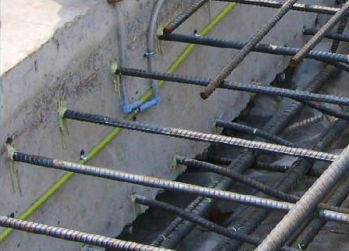 PVC water stops are preformed strips with flanges that are placed within the concrete forms.