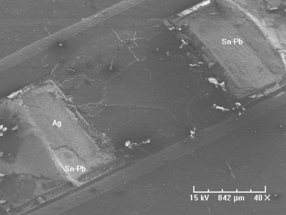 4 Fracture Surface SEM/EDS Analysis The fracture interfaces of SAC305 solder joints and SnPb solder joints after thermal shock are shown in Figure 10 and Figure 11, respectively.