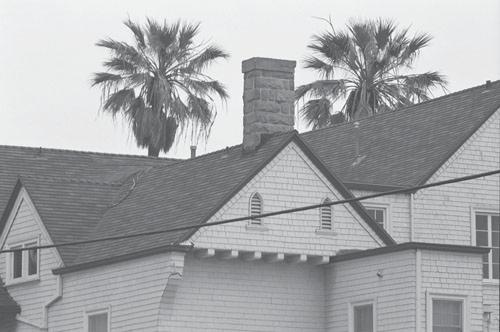 The terms gable and hip refer to the shape of the roof. A review of buildings in the area indicates that the roof is one of two primary elements in the shape of buildings.