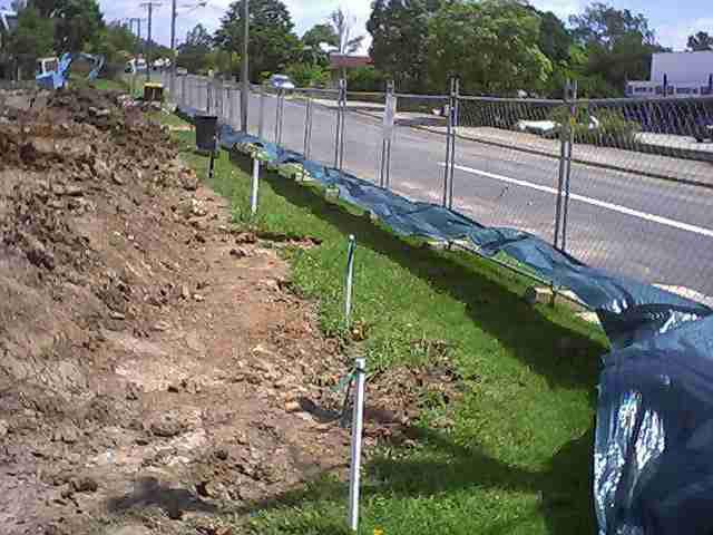 An example of a poorly installed sediment fence on a land