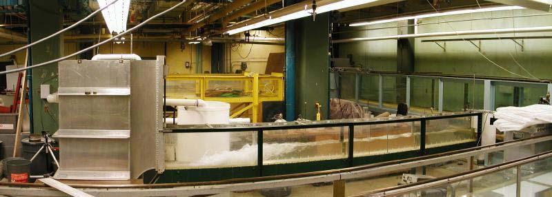 CEE 33 Lab 3 Page 3 of 8 Figure : Constant-head flume with supercritical flow exiting the sluice gate equipped head box (metal structure on the left-hand side of picture), a hydraulic jump at the
