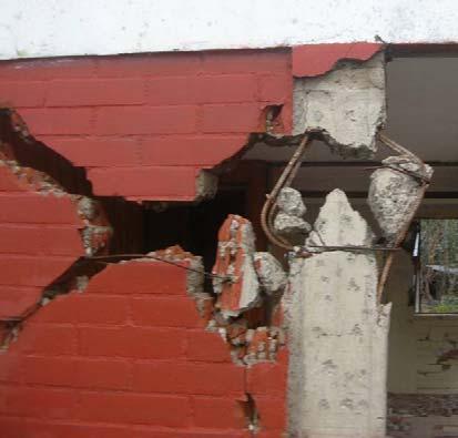 Seismic Design Guide for Low-Rise Confined Masonry Buildings when increased axial compression stresses develop in localized areas where masonry has been completely disintegrated.