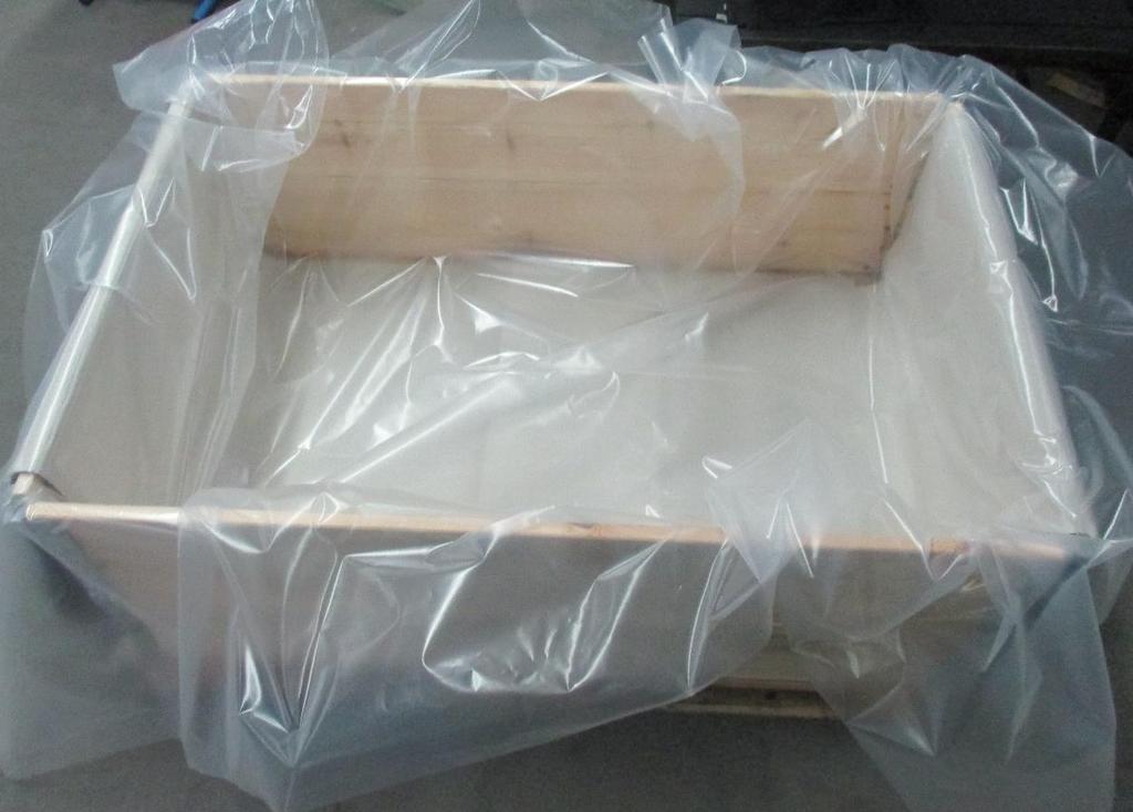 wooden crate is lined with film