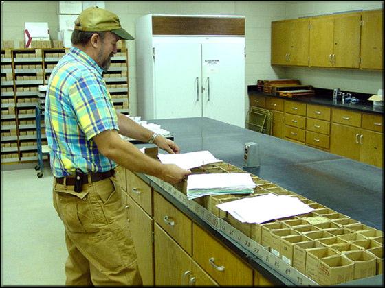 Checking the Forms - The order of the samples is double checked against the sample submission forms in each set.
