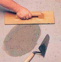 Once the spatter-dash coat has dried, apply the Planicrete SP cement and sand mortar to the required thickness using a flat-edged trowel.