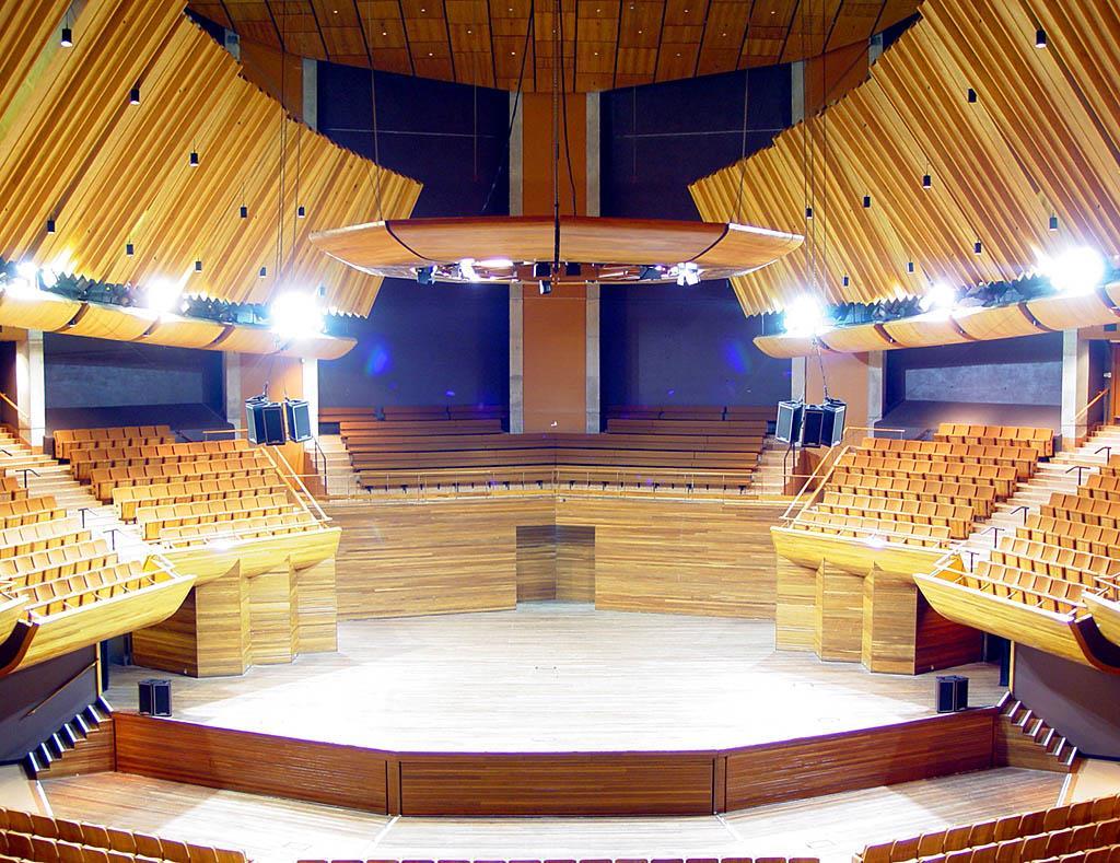 Hall with a raised stage and curved