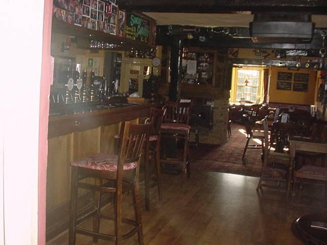 Main Bar Area Papered with timber beams Dated and marked Painted with timber dado to approx one and a half metres Dated and marked Veneered timber Threshold Joinery: