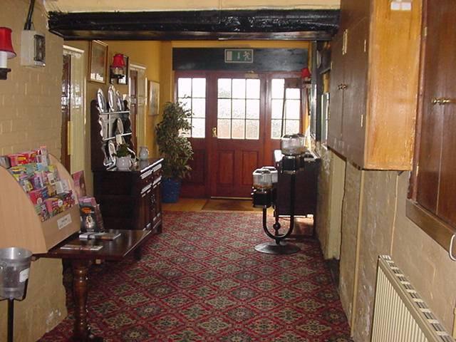 Access Corridor to Toilets and Function Room Timbered and plastered Dated and marked Papered and stonework Dampness found Stop