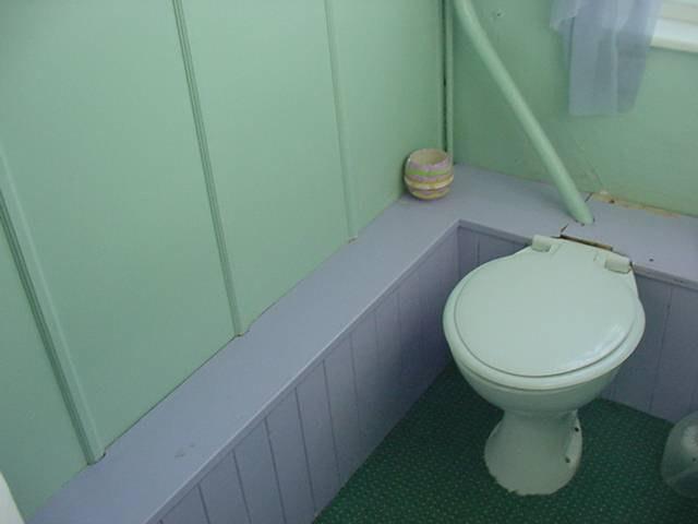 WC Painted plaster Average Painted boards Timber boarding to half a metre (we think duct work for piping) Average